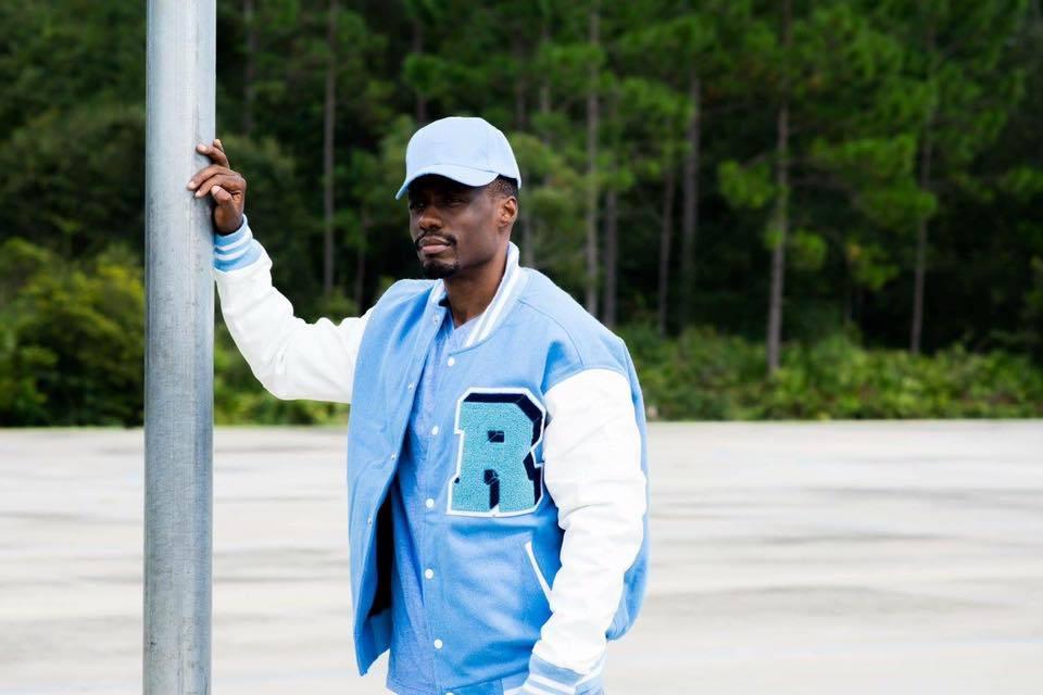 Jean Ribault Columbia Blue Melton Wool Letterman jacket with real cowhide white leather sleeves with a high quality chenille and felt 'R' Letter and Trojan Mascot patches for that true personalized look. this jacket has an inside semi zip-out quilt lining making it easy for you to add your own patches and embroidery if you desire. 